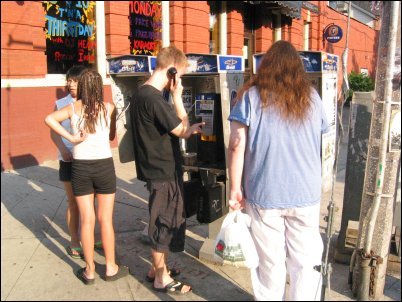 As cell networks jammed and towers ran out of juice, line-ups formed at the pay phones.