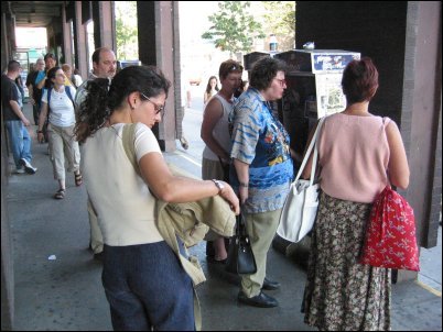 Frustrated cell phone user searches for a quarter...